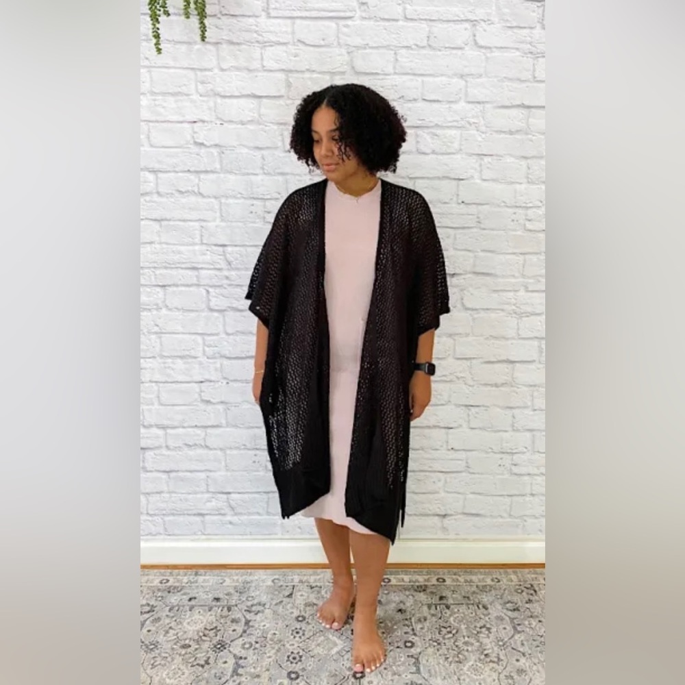Open knit poncho. An effortless layer to wear all season long 2 colors available